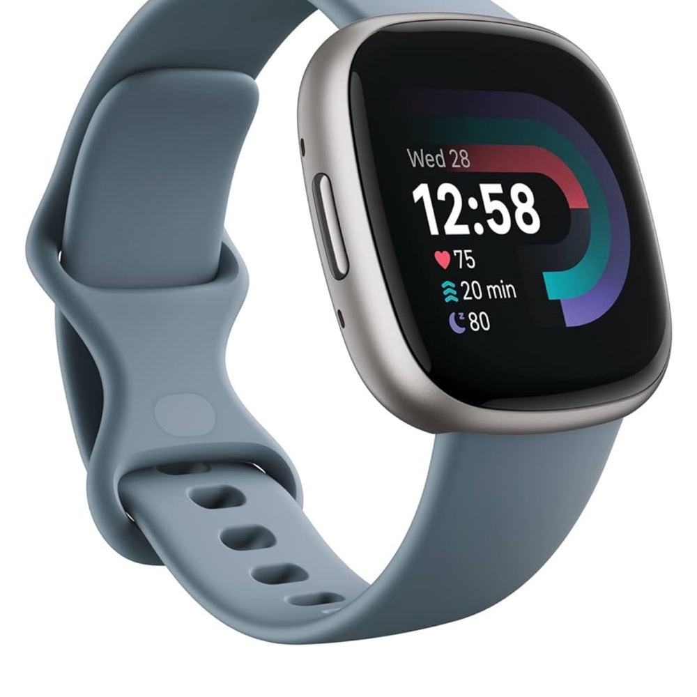Fitbit versa 2 Smartwatch with Blue Band.
